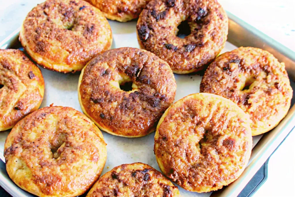 Freshly baked cinnamon sugar bagels with a sweet topping